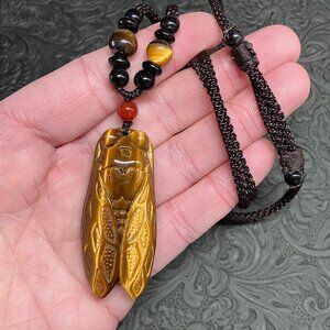 Carved Tigers Eye Cicada Bug Necklace (1)
